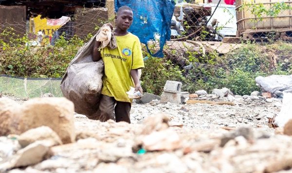 boy picking plastic 1
